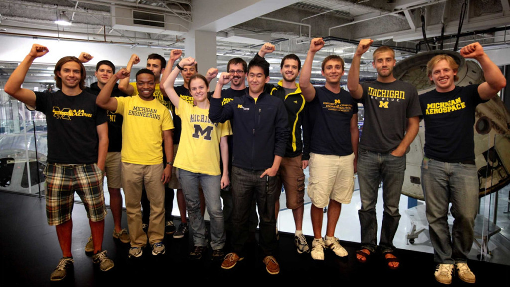 students in a lab being proud of Michigan aerospace